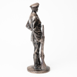 Old silver-plated metal officer statue