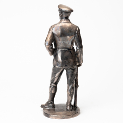 Old silver-plated metal officer statue